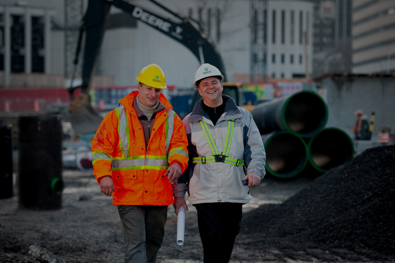 Soleno team members on a construction site providing technical support for stormwater infrastructure projects.