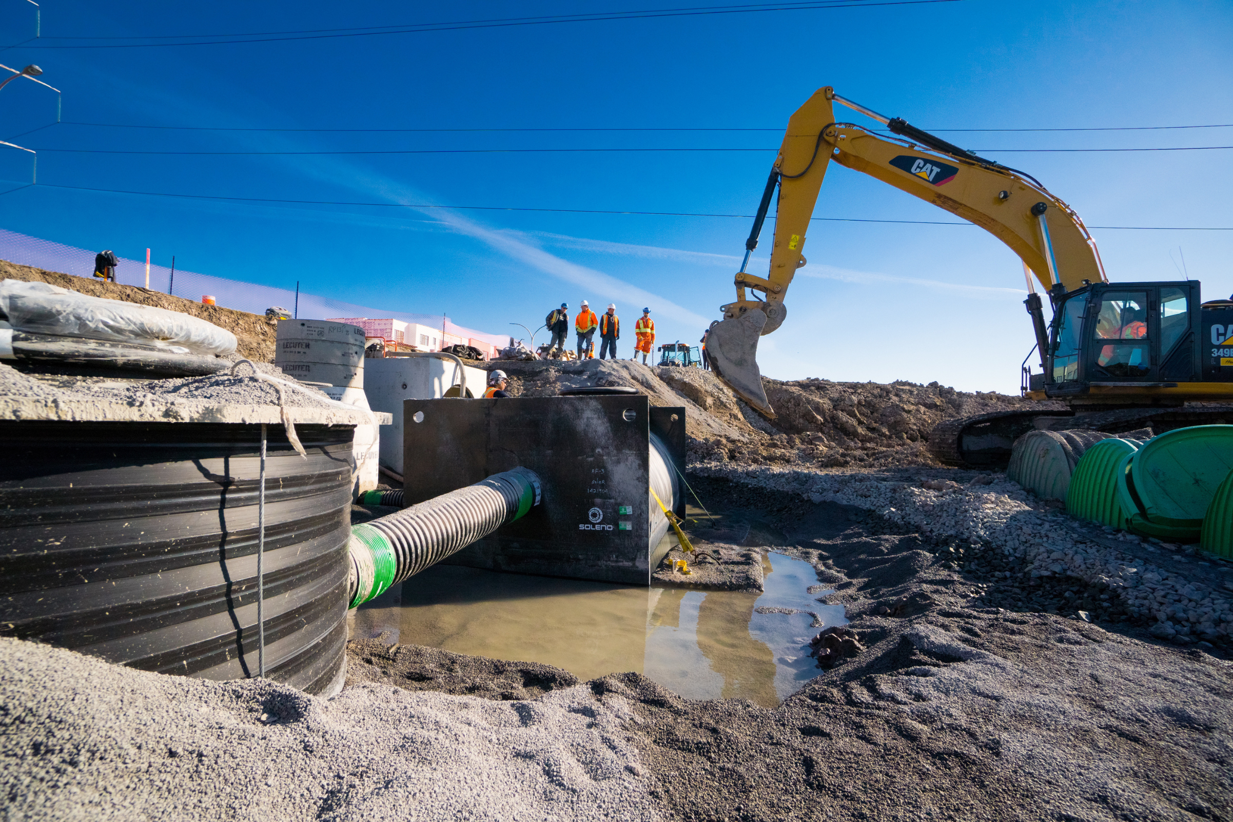 Stormwater pretreatment system removing sediment before entering the retention basin